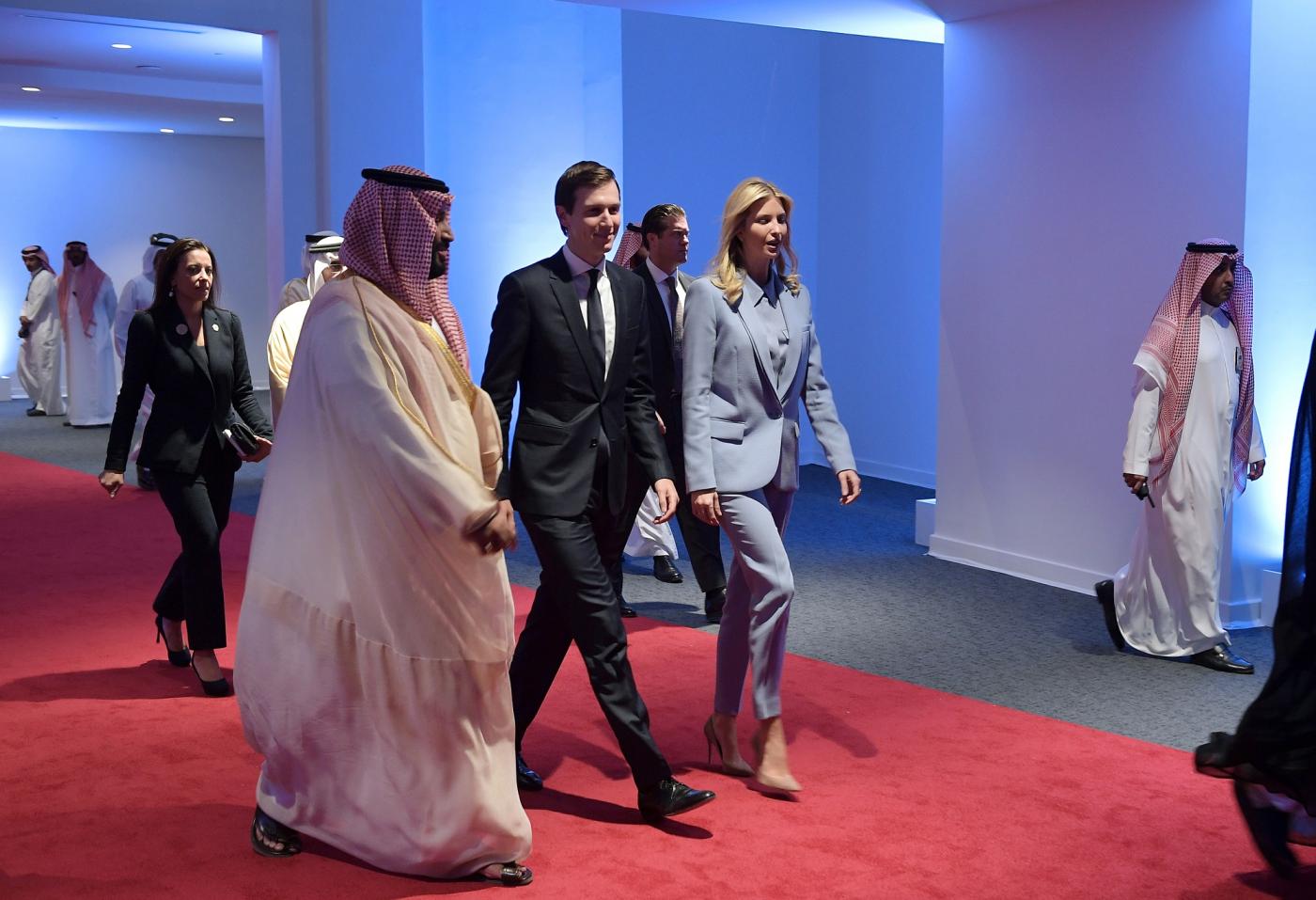 Saudi Crown Prince Mohammed bin Salman walks with US presidential adviser Jared Kushner and his wife, Ivanka Trump, in 2017 (AFP/File photo)
