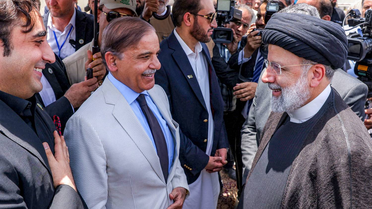 Iran's President Ebrahim Raisi and Pakistan's then-prime minister Shahbaz Sharif attend a ceremony to inaugurate a new market in the border city of Pishin, Iran on 18 May 2023.