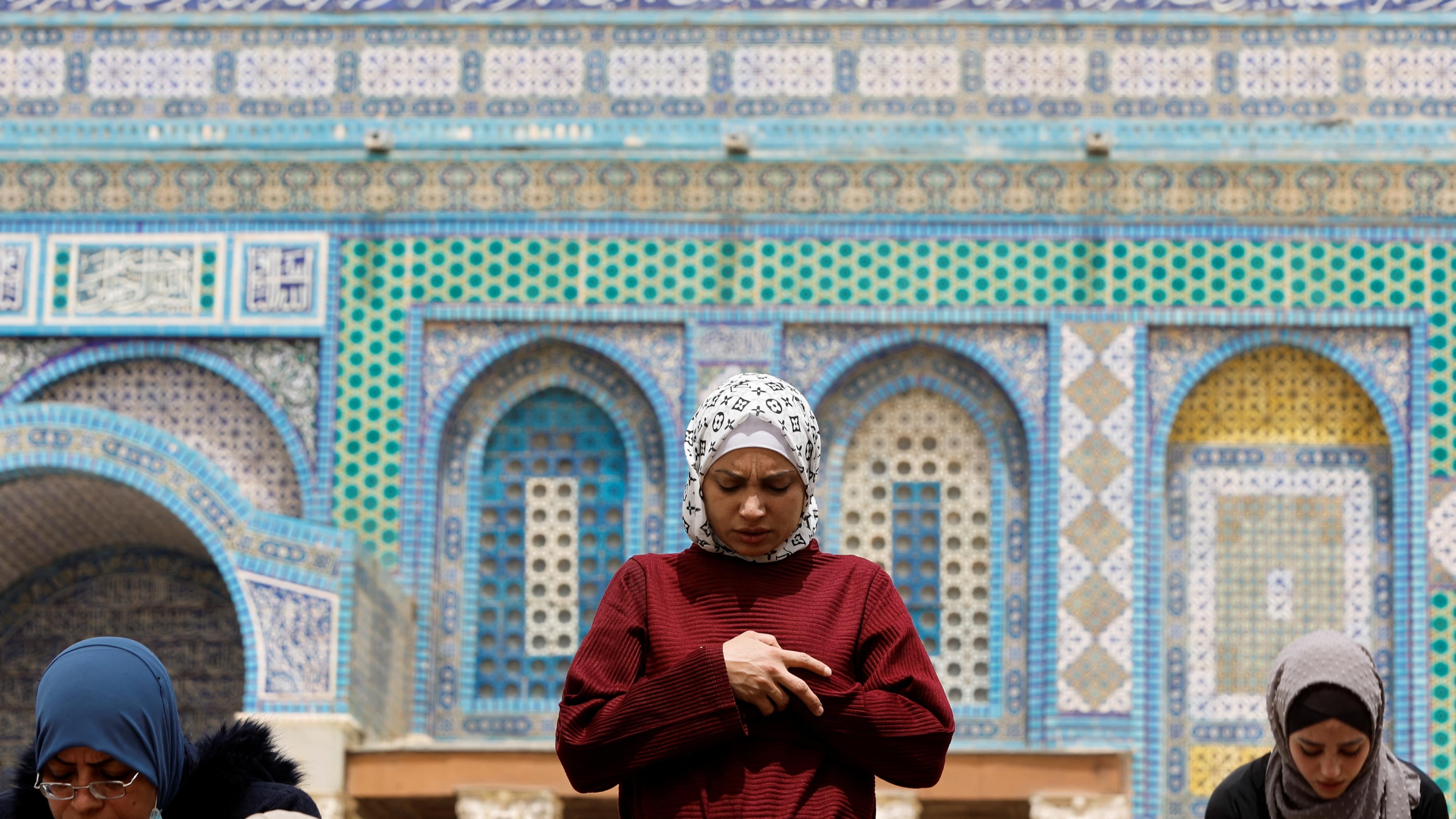 Muslim women pray during the first Friday prayer of Ramadan in al-Aqsa Mosque (Reuters)
