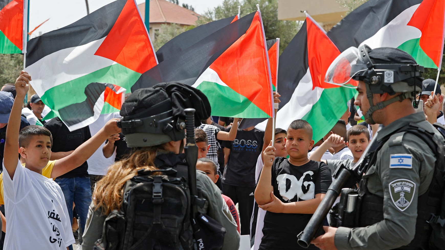 Palestinian citizens of Israel rally in the mixed city of Lydd on 13 May 2022 (AFP)