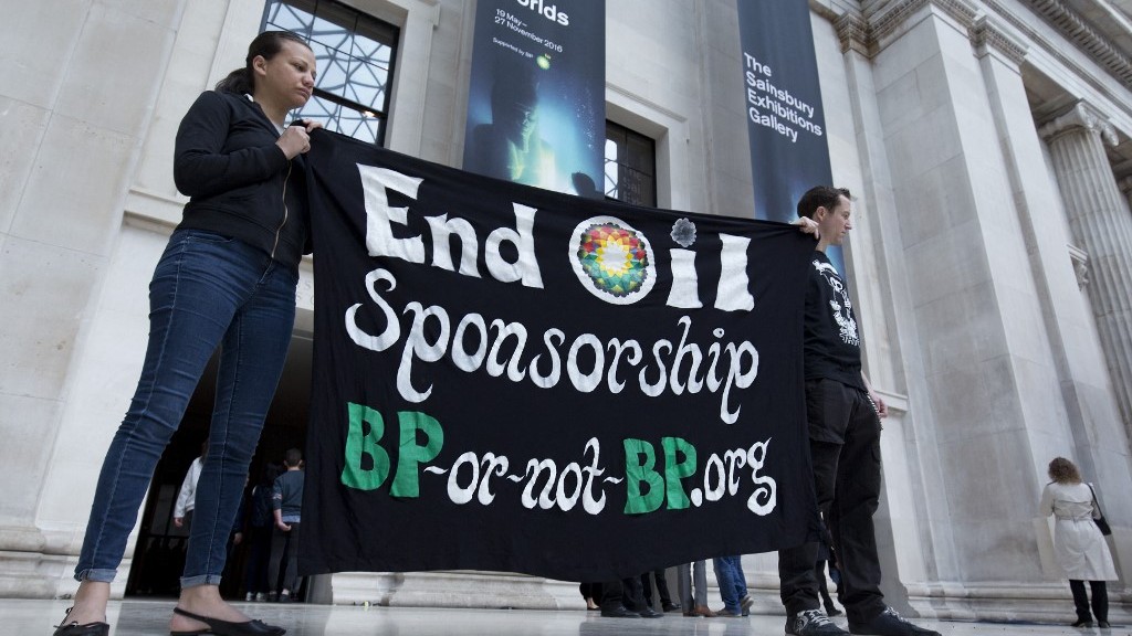 Activists protest BP’s sponsorship of an Egypt exhibit at the British Museum in May 2016 (AFP)