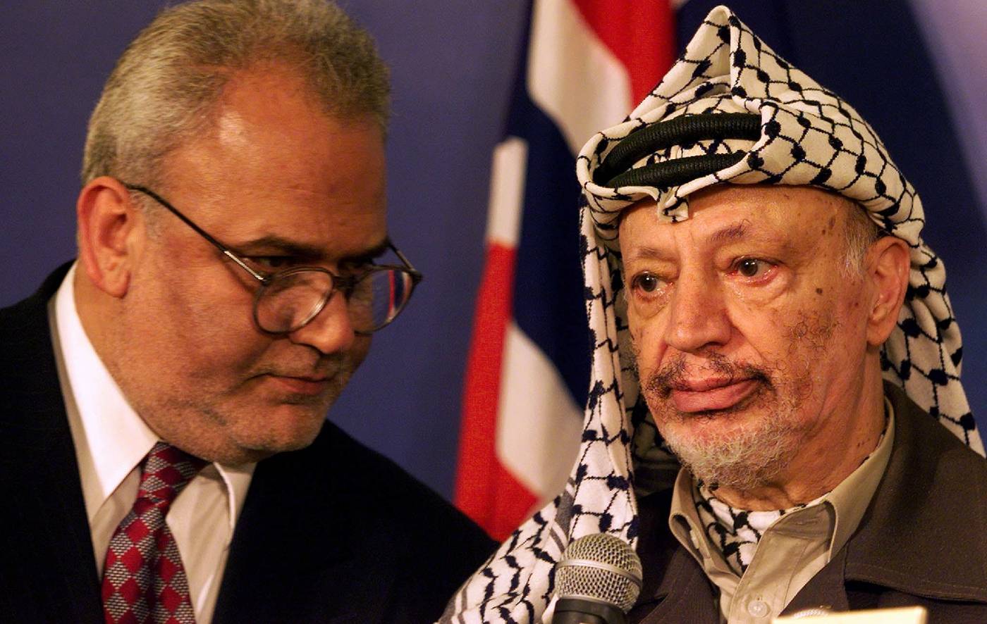 Palestinian leader Yasser Arafat (right) with Saeb Erakat in Oslo in November 1999 