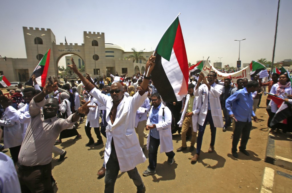 Sudanese protesters demonstrate in Khartoum on 17 April (AFP)