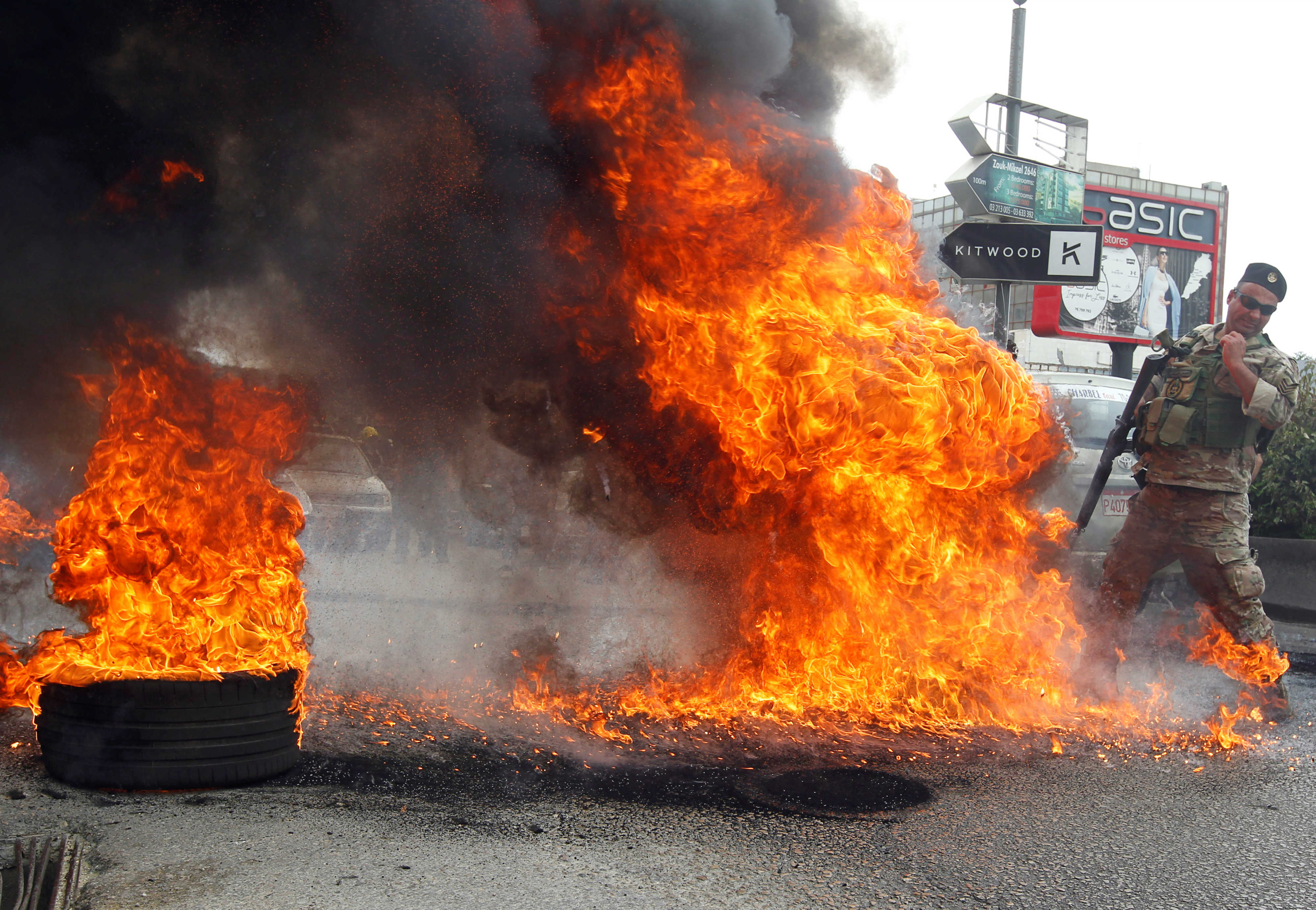 In Zouk, north of the capital Beirut, some roads were blocked by burning tyres (Reuters)