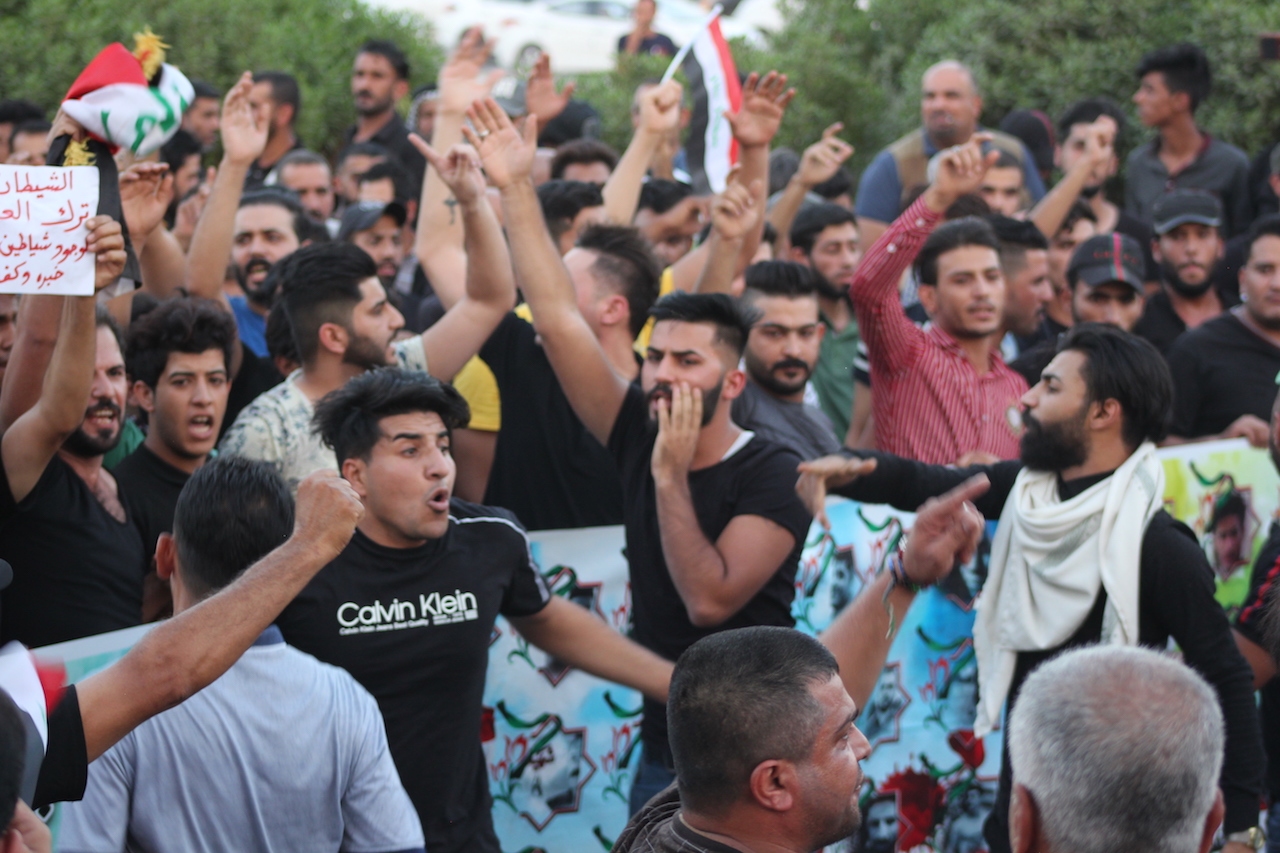 Protesters demonstrate in Basra in September 2018 (MEE/Alex MacDonald)
