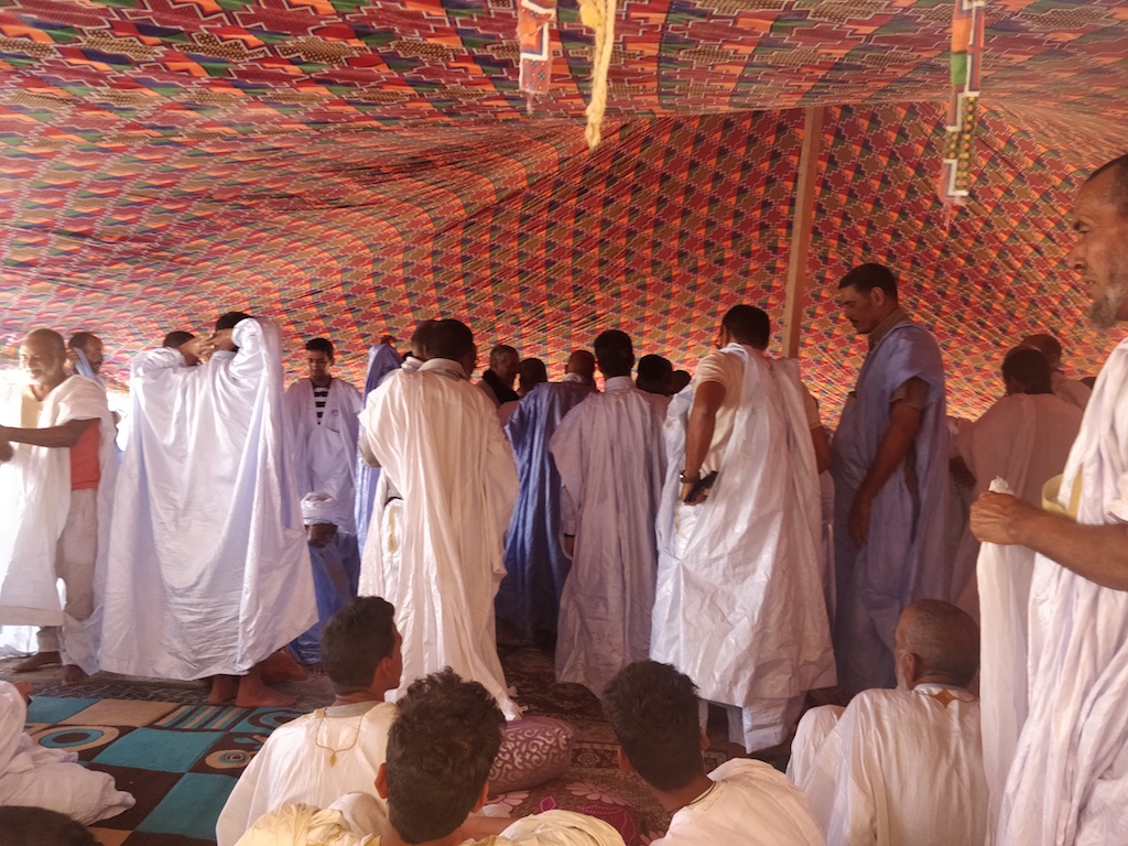 Mauritanian men gather in a tent (Amandla Thomas-Johnson)