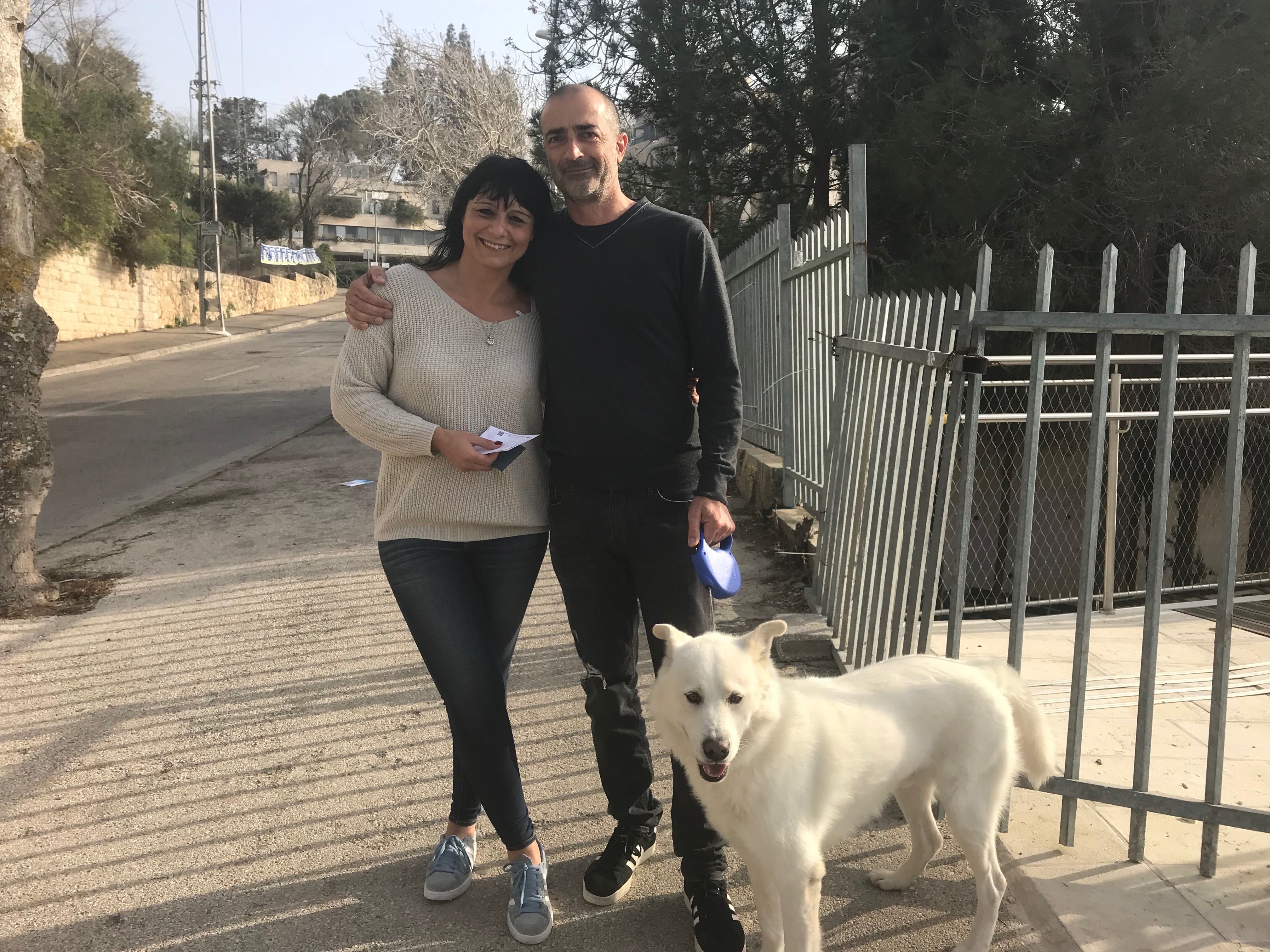 Valeria and Yossi outside a Jerusalem polling station (MEE)