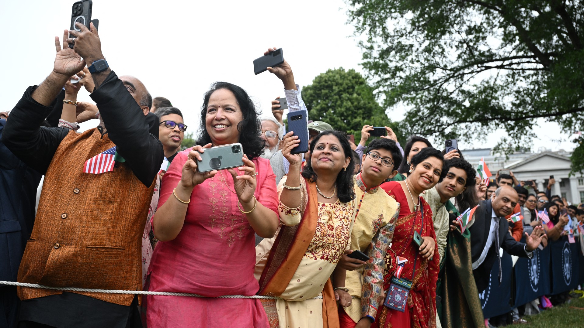 Indian-American community gather outside the White House to greet Indian Prime Minister Narendra Modi on 22 June 2023 (AFP)