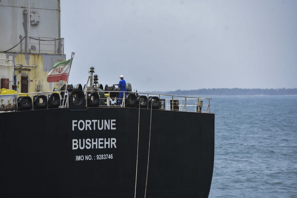 An Iranian-flagged oil tanker docks in Venezuela on 25 May (AFP)