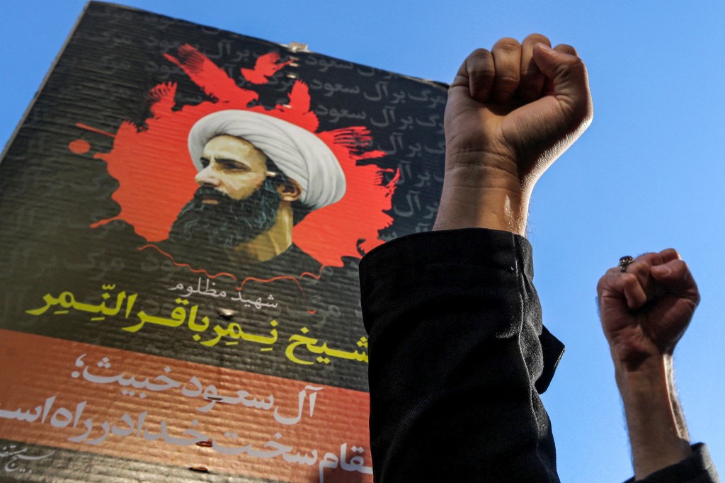 Iranians protest against the execution by Saudi authorities of prominent Shia cleric Sheikh Nimr al-Nimr outside the Saudi embassy in Tehran on 3 January 2016 (AFP)