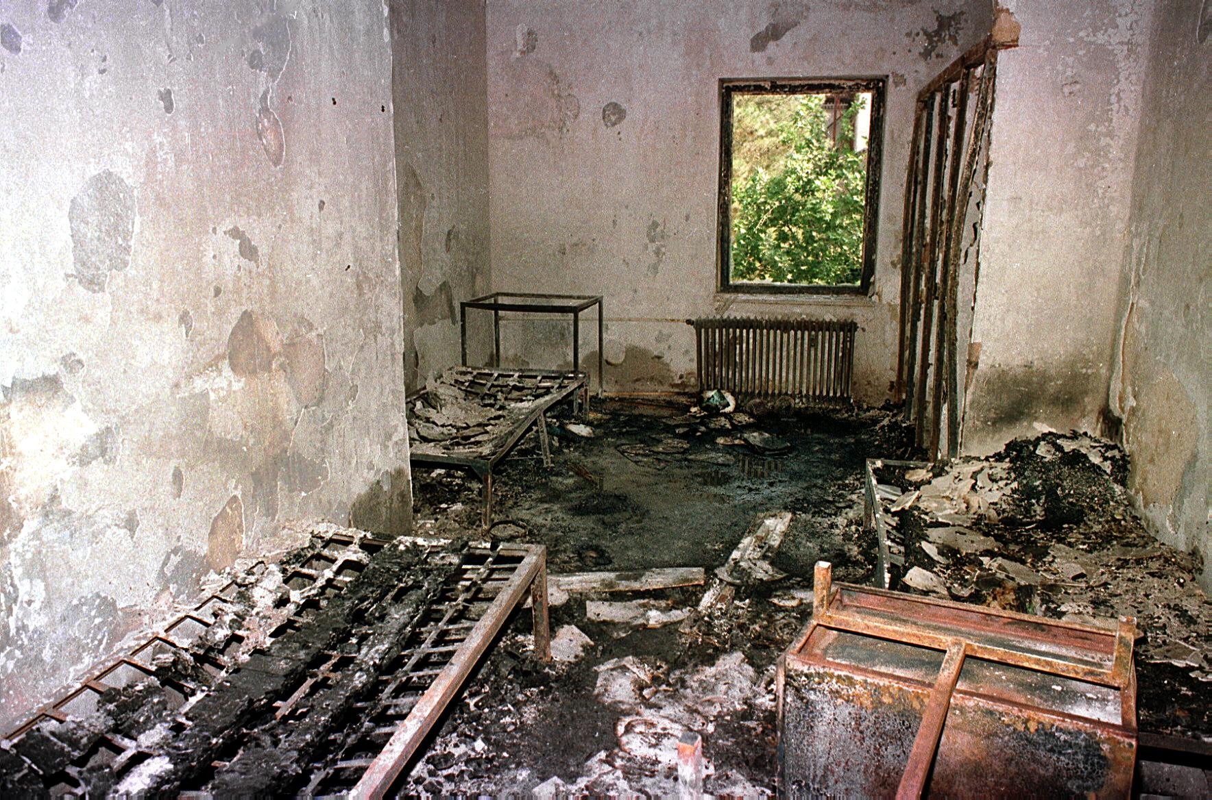 A burnt out room in a University of Tehran dormitory on 10 July 1999 (AFP)