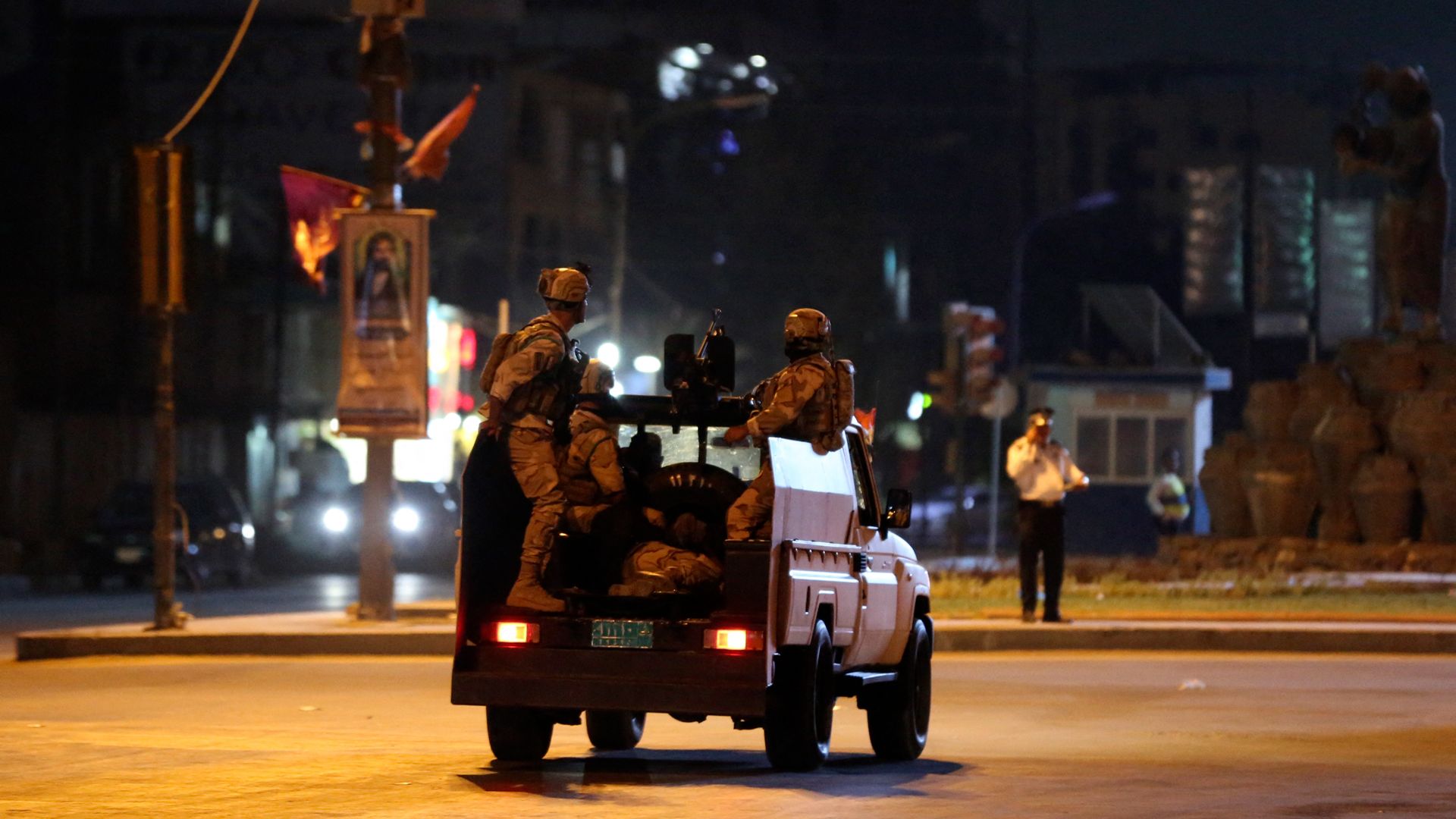 An Iraqi security vehicle patrols a street in the capital Baghdad.