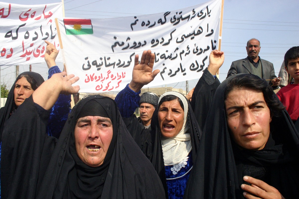 Kurdish women protest in the northern city of Kirkuk 06 March 2005, demanding the return of their properties and rights which were snatched away during the regime of ousted President Saddam Hussein (AFP)