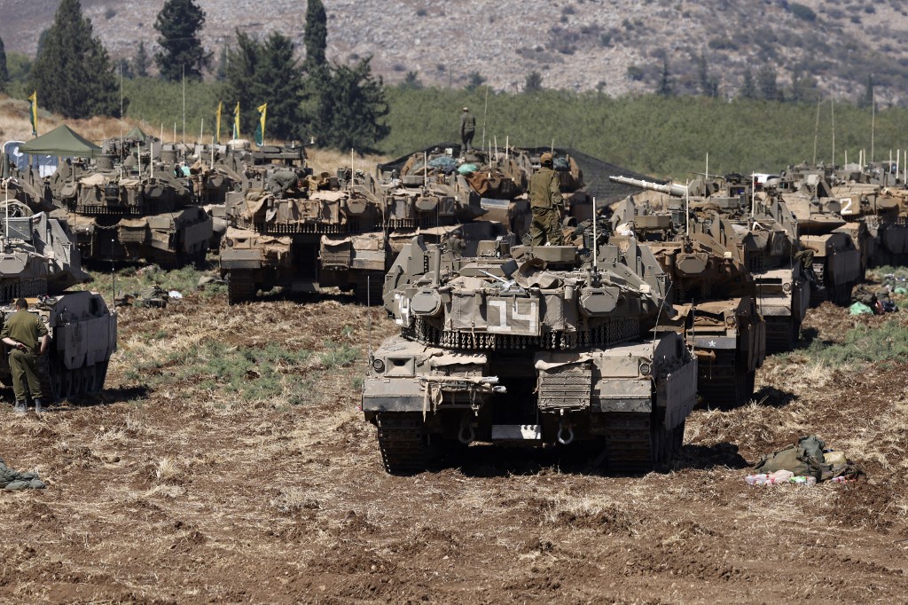 sraeli troops deploy in an area in the Upper Galilee region in northern Israel on September 27, 2024. 