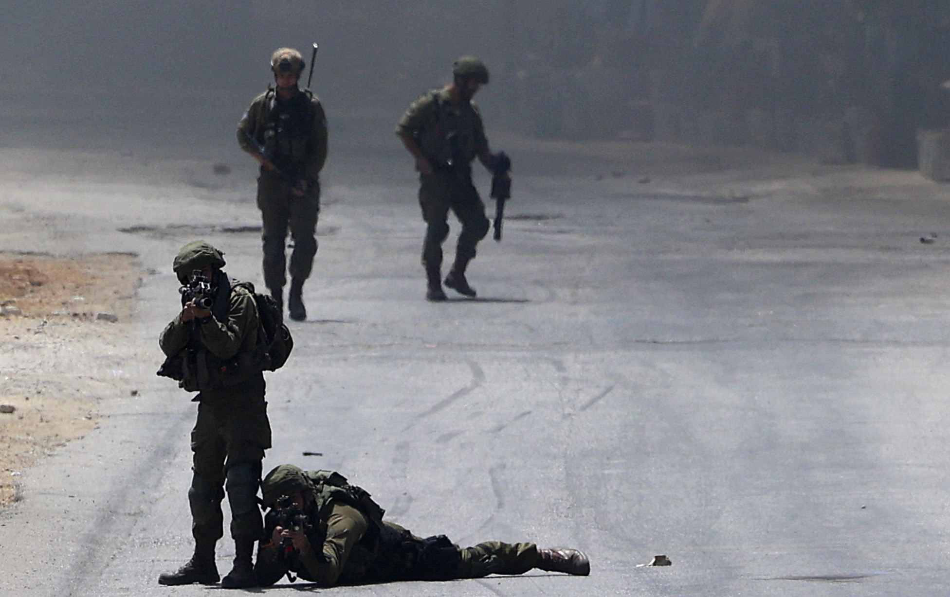 Israeli army targets young Palestinians who protest against the occupation, 2021 (AFP)