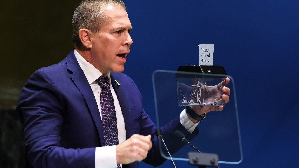 Gilad Erdan, then Israel’s ambassador to the United Nations, shreds the UN Charter at a General Assembly session on 10 May 2024 (Charly Triballeau/AFP)