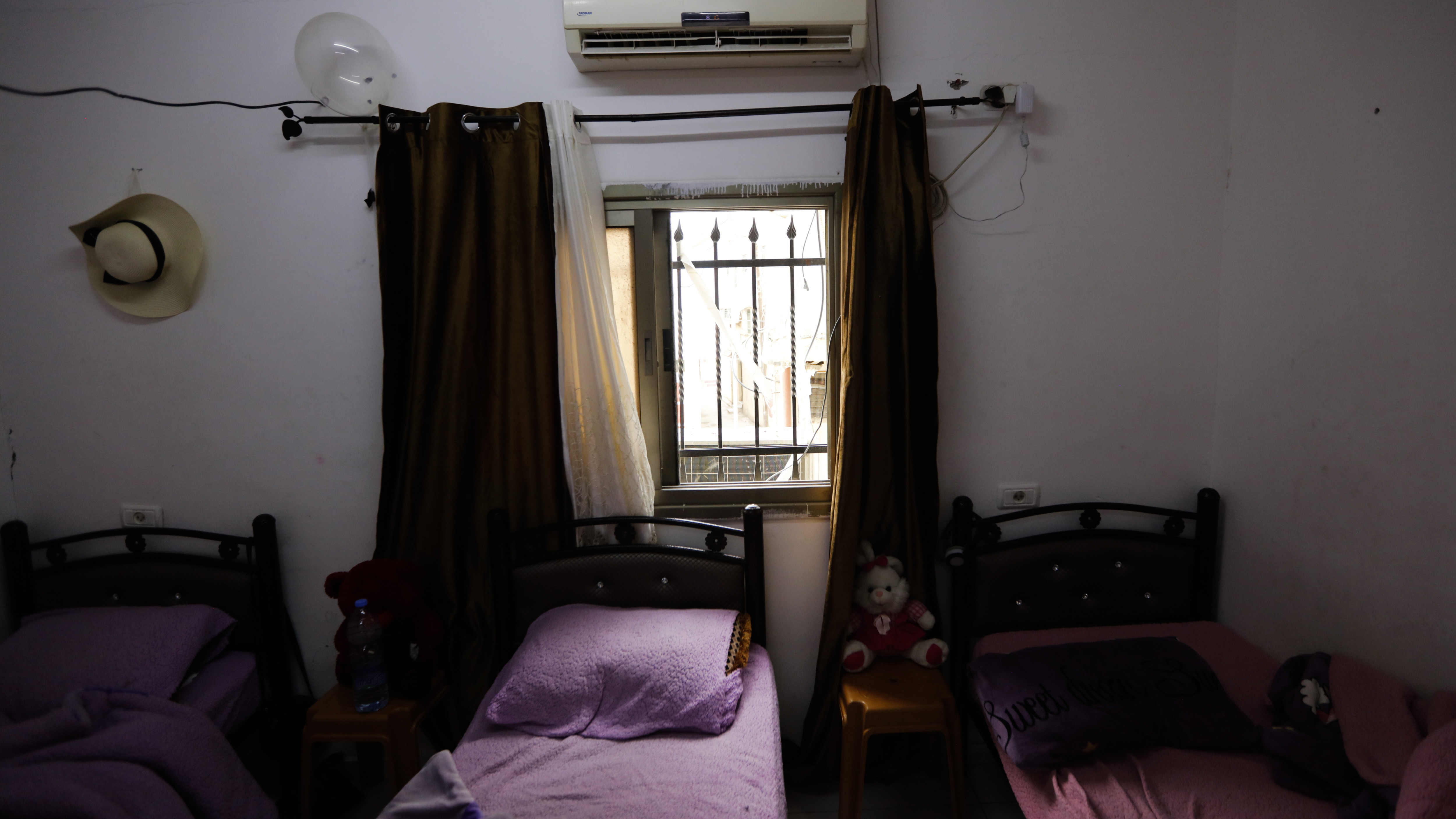 View from Muqbil's bedroom which Israeli soldiers used to station a sniper that killed 17-year-old Mohammed al-Ladda in Aqbat Jabr refugee camp in the West Bank on 1 May 2023 (MEE/Palestine Product)