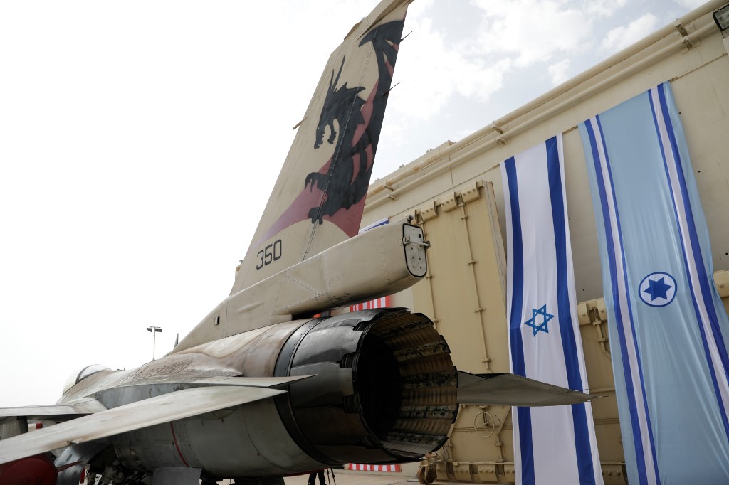 An Israeli F-16 fighter jet is seen during an aerial exercise on 11 November (AFP)