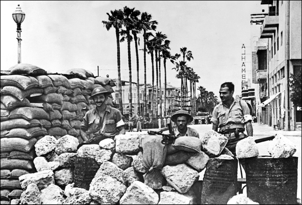Members of the Haganah, the Jewish Agency force, stand guard in Jaffa in May 1948 (AFP) 