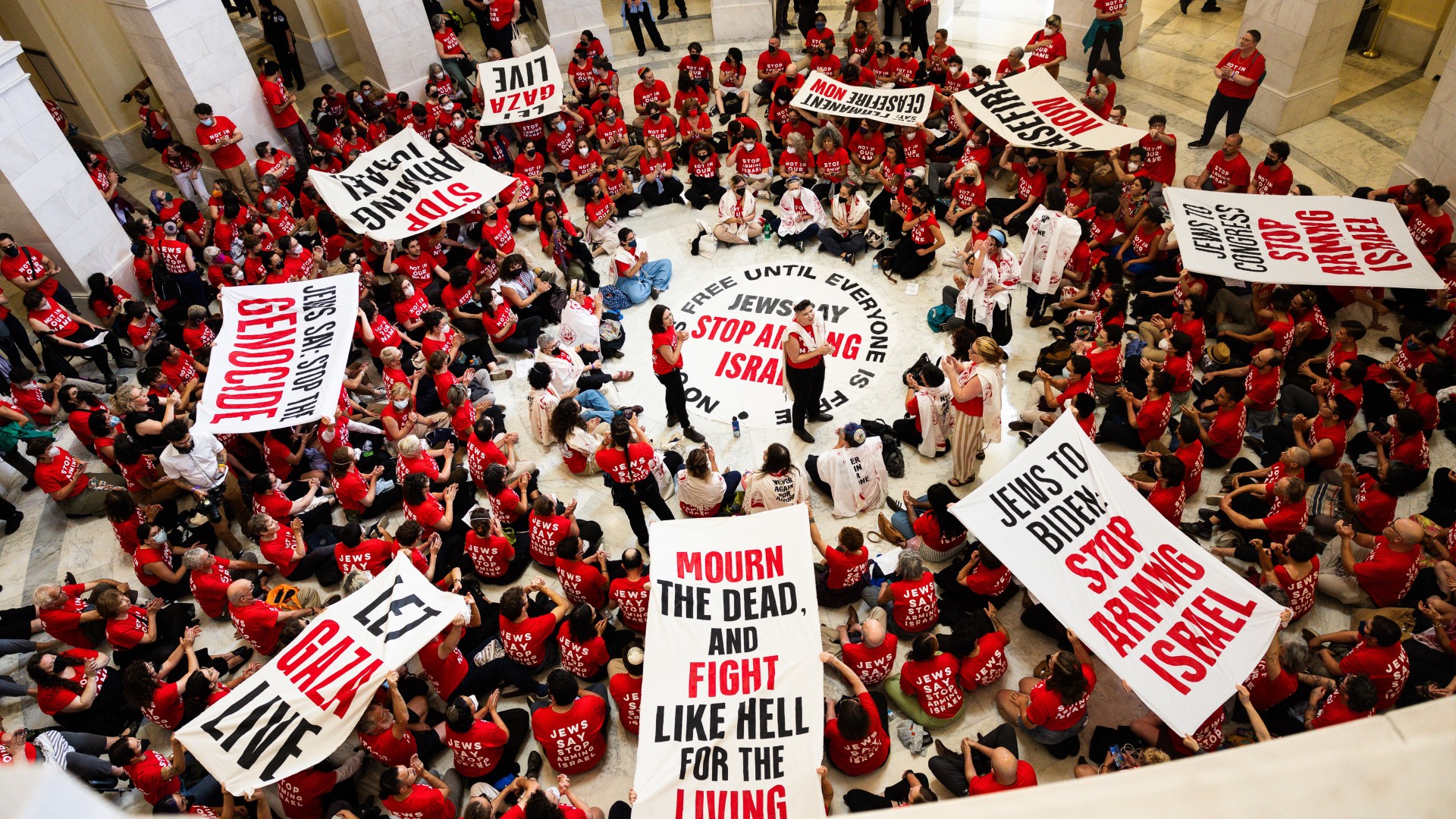 Demonstrators from Jewish Voice For Peace protest the war in Gaza at the Canon House Building on July 23, 2024 in Washington, DC.  (Tierney L. Cross/AFP) 