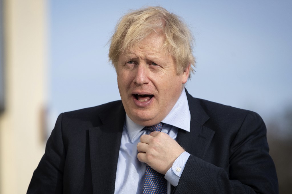British Prime Minister Boris Johnson campaigns in southwest England on 28 November (AFP)