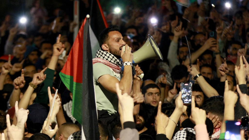 Jordanians chant slogans during a pro-Palestinian demonstration in Amman on 28 March 2024 (Khalil Mazraawi/AFP)