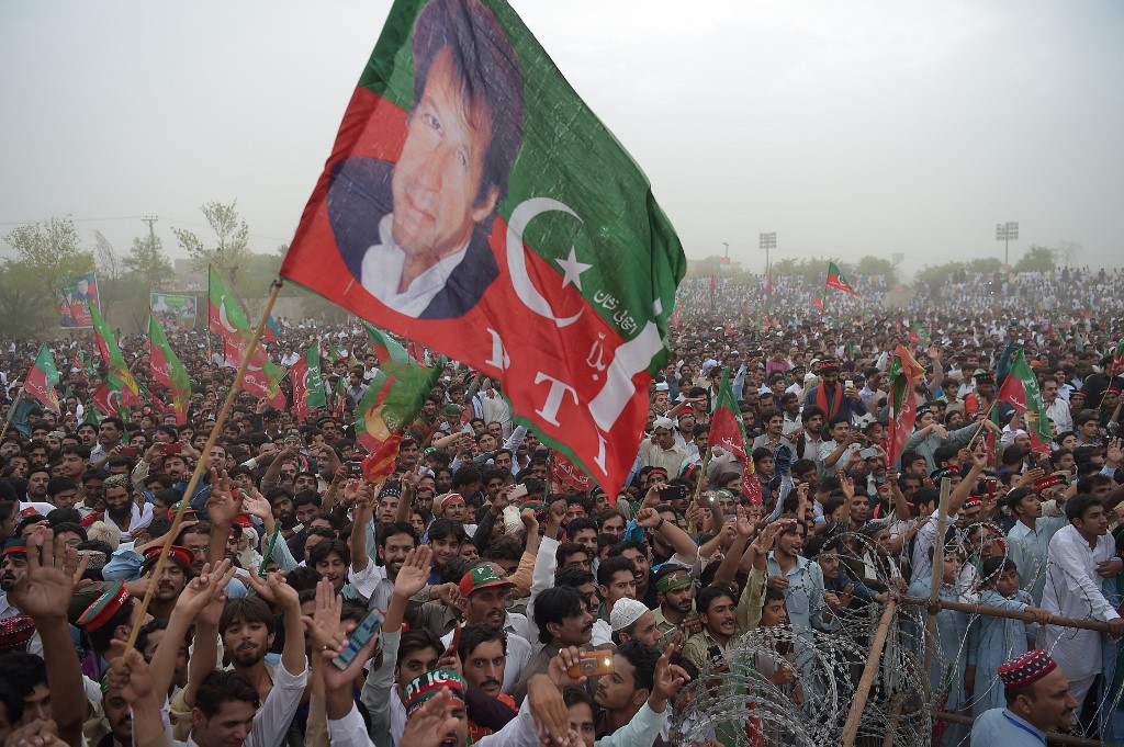 Khan’s supporters attend an election campaign meeting in Mianwali in June 2018 (AFP)