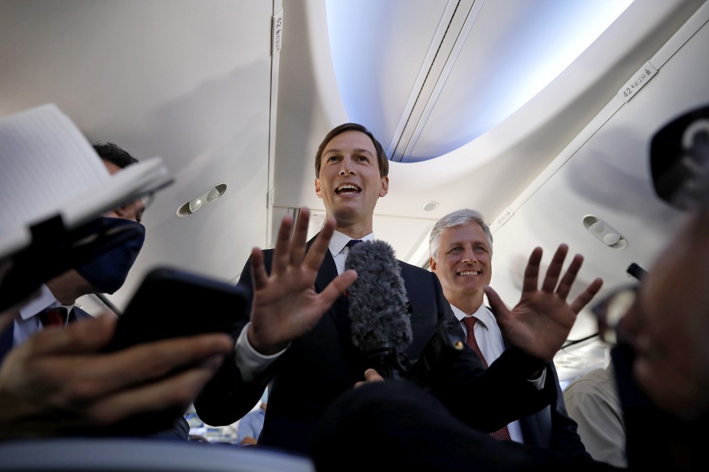 US presidential adviser Jared Kushner speaks aboard the El Al flight on 31 August (AFP)