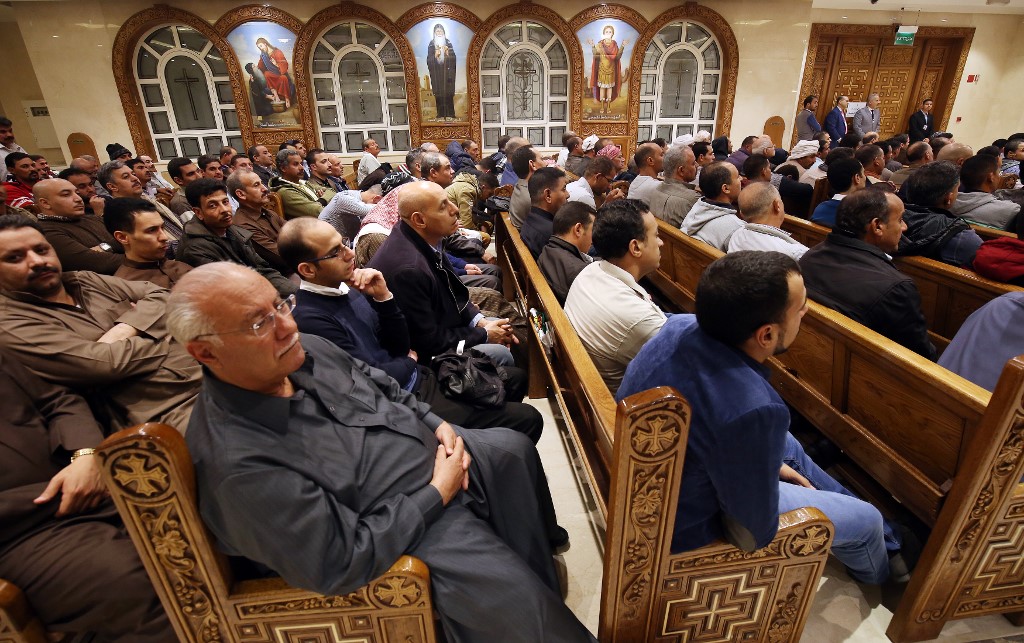 Des coptes orthodoxes égyptiens vivant au Koweït assistent à la messe de Noël en l’église orthodoxe copte Saint-Marc à Koweït, le 6 janvier 2019 (AFP)