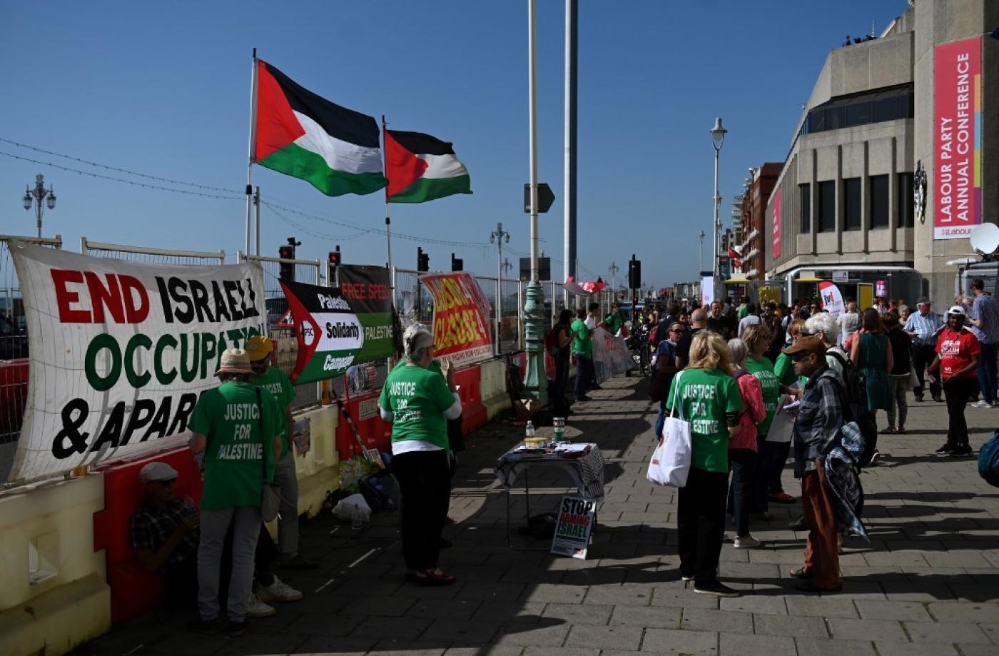 Demonstrators protest outside the Labour party conference in Brighton, on the south coast of England on 21 September 2019 (AFP)
