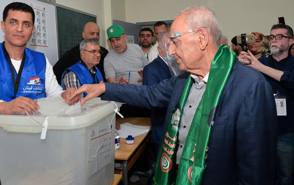 A handout picture provided by the Lebanese Parliament on May 15, 2022 shows Lebanese Speaker Nabih Berri casting his vote for parliamentary elections, at a polling station in the southern village of Tebnin.