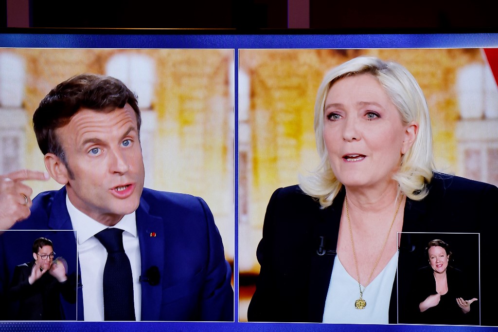Macron and candidate Marine Le Pen participated in a televised debate ahead of the second round of voting, which took place on 24 April 2022 (AFP)