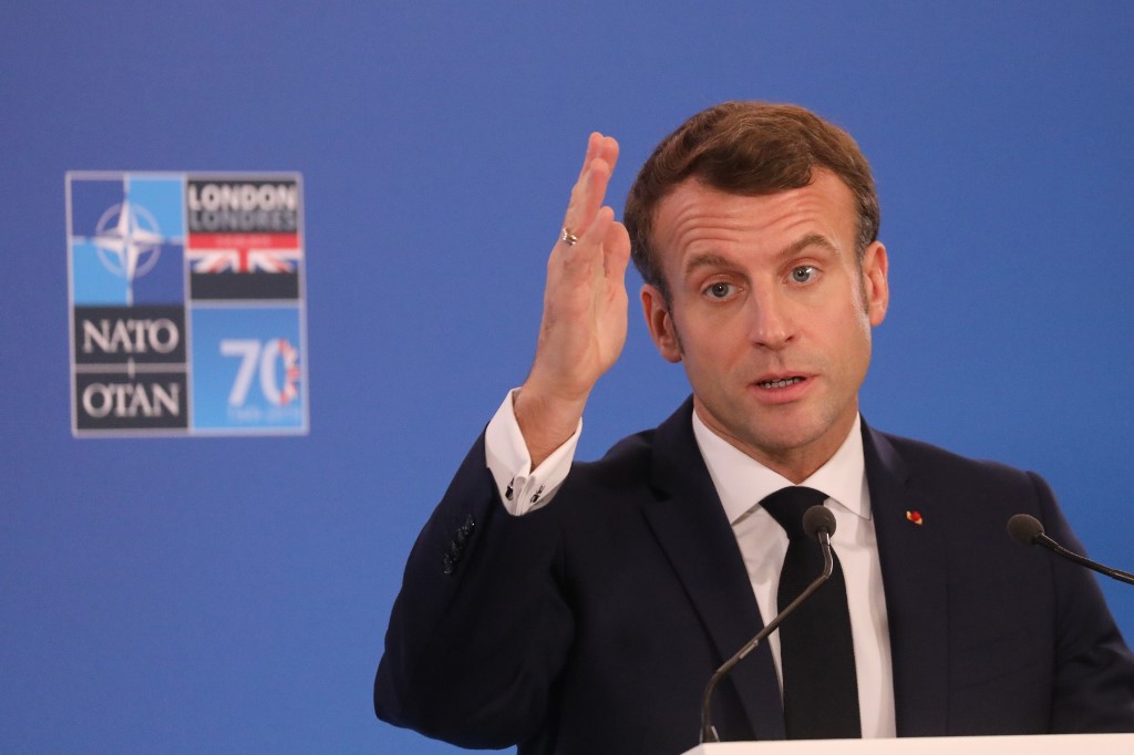 French President Emmanuel Macron speaks at the NATO summit near London on 4 December (AFP)