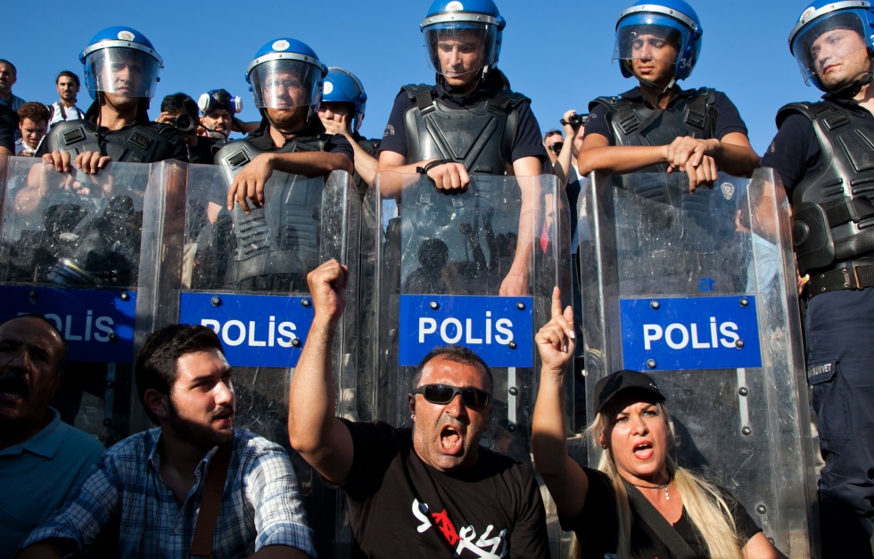 Riot police block anti-government protesters from Gezi Park in July 2013 (AFP)