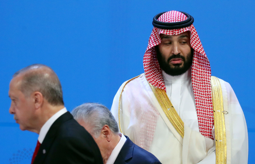 Turkish President Tayyip Erdogan and Saudi Arabia's Crown Prince Mohammed bin Salman are seen during the G20 summit (Reuters)