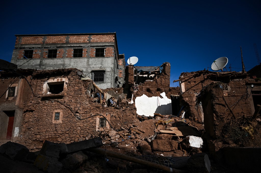 Bâtiments détruits par le tremblement de terre du 8 septembre 2023 dans le village d’Imi Oughlad, province d’Al Haouz, dans la chaîne du Haut Atlas, au centre du Maroc (AFP/Philippe Lopez)