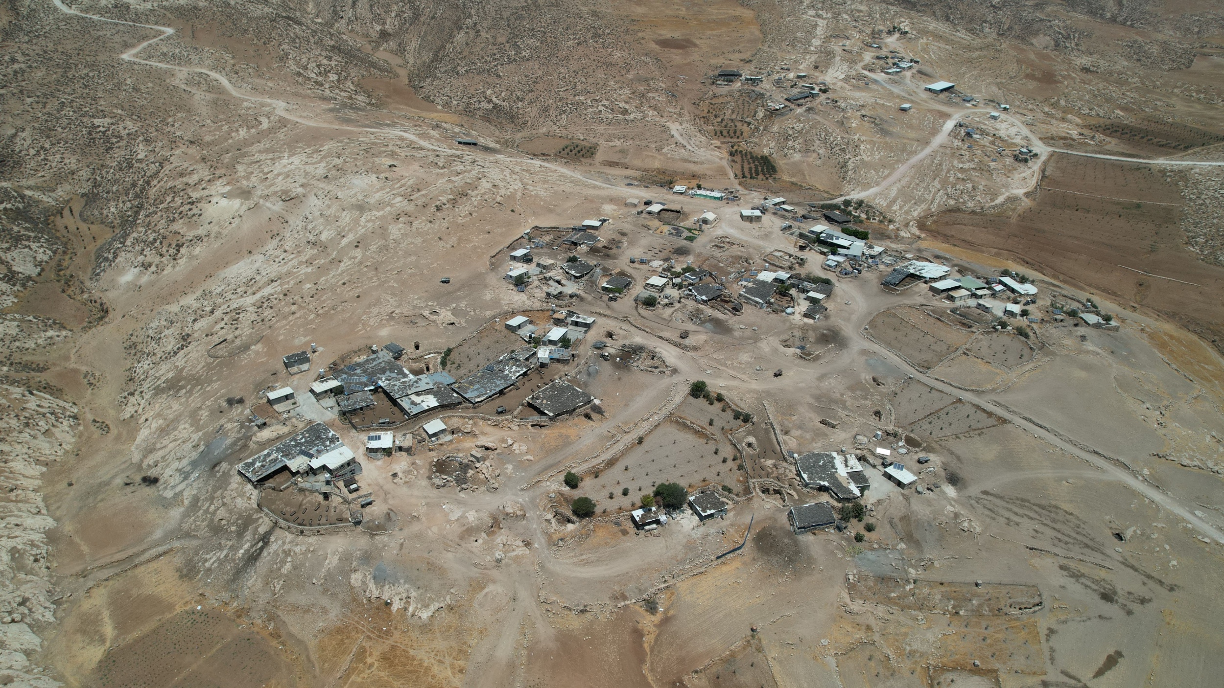 An aerial view of Janba village south of Hebron in the occupied West Bank taken on 19 June 2022 (MEE/Hisham Abu Shaqrah)
