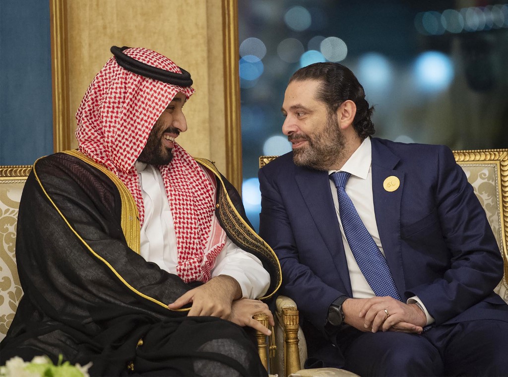 Saudi Crown Prince Mohammed bin Salman chats with Lebanese Prime Minister Saad Hariri in Mecca in 2019 (Bandar al-Jaloud/Saudi Royal Palace/AFP)