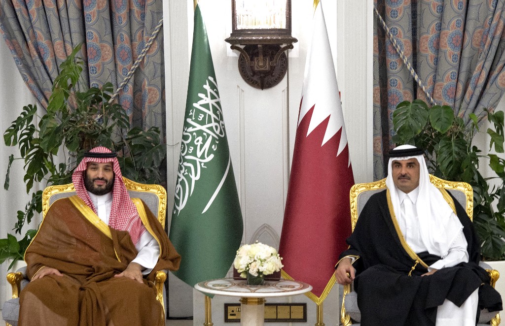 Qatar’s emir, Sheikh Tamim bin Hamad al-Thani, meets Saudi Crown Prince Mohammed bin Salman in Doha on 9 December 2021 (Qatar News Agency/AFP)