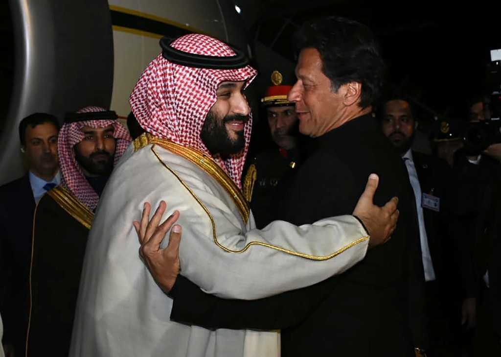 Saudi Crown Prince Mohammed bin Salman and Pakistani Prime Minister Imran Khan greet one another in Islamabad last February (AFP)