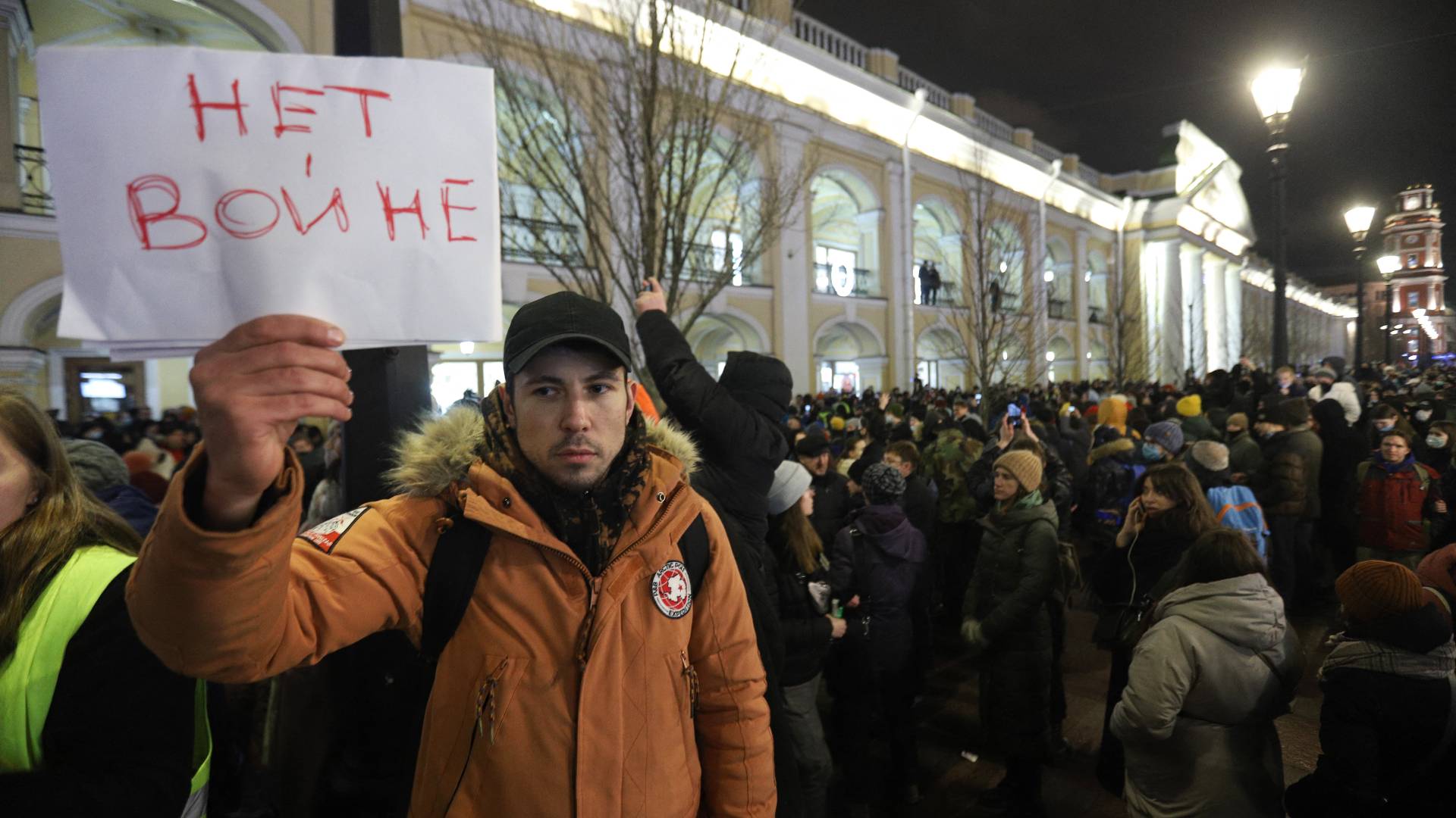 A demonstrator holding a placard reading "No to war" protests against Russia's invasion of Ukraine in central Saint Petersburg on February 24, 2022.