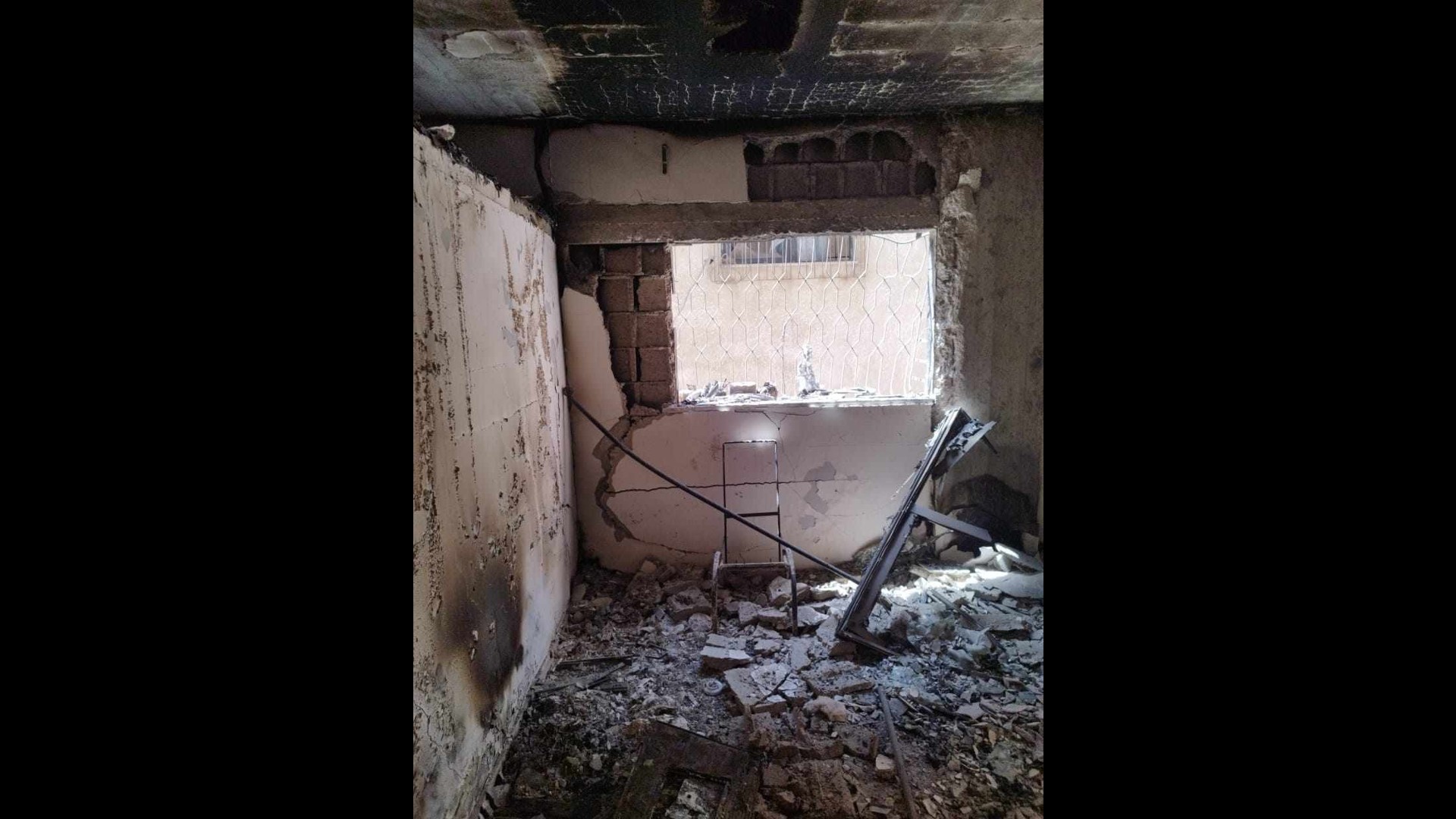 The burnt room where bones were found by the family on 8 April 2024 in Gaza City (Supplied)