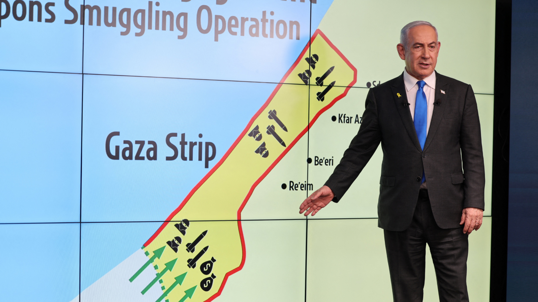 Netanyahu stands before a map showing the Gaza Strip, during a press conference for international media at the Government Press office in Jerusalem on 4 September 2024 (Abir Sultan/Pool via Reuters)