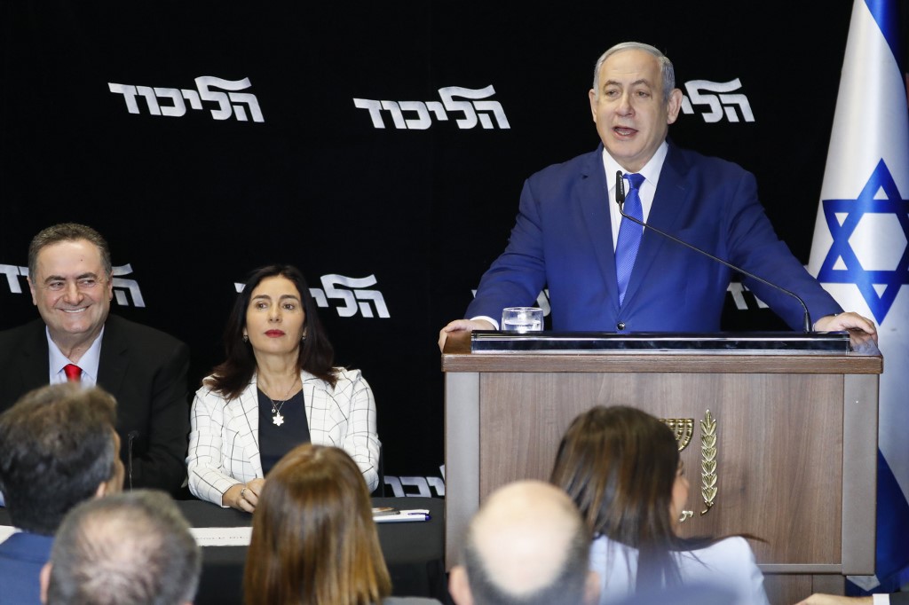 Israeli Prime Minister Benjamin Netanyahu speaks near Tel Aviv on 27 December (AFP)