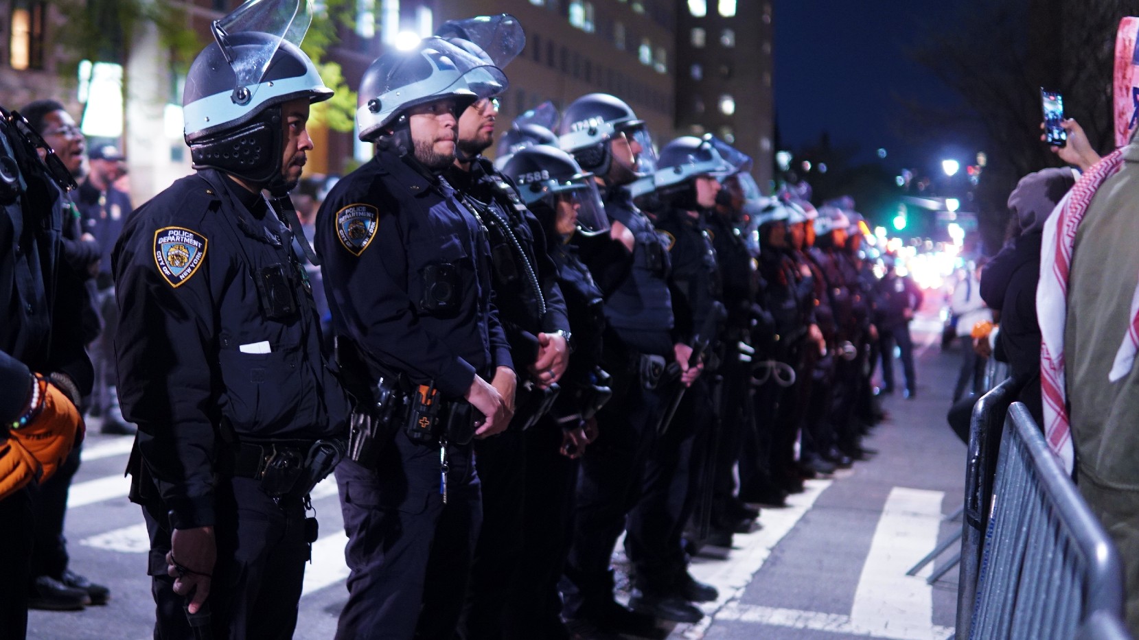 The NYPD has been a regular fixture outside universities in New York in May (Azad Essa/MEE)