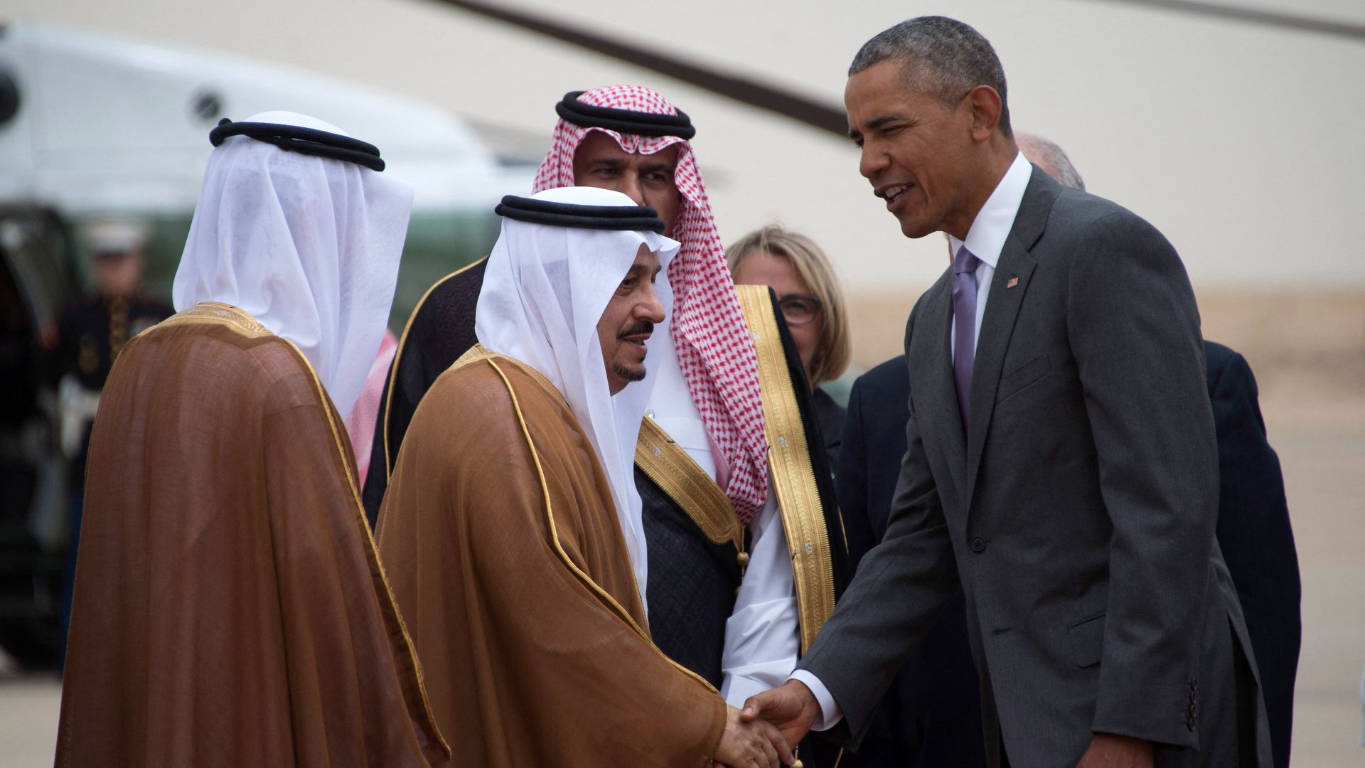 US President Barack Obama shakes hands with Riyadh governor Prince Faisal bin Bandar bin Abdelaziz al-Saud as he arrives at King Khalid International Airport in the Saudi capital on 20 April 2016.