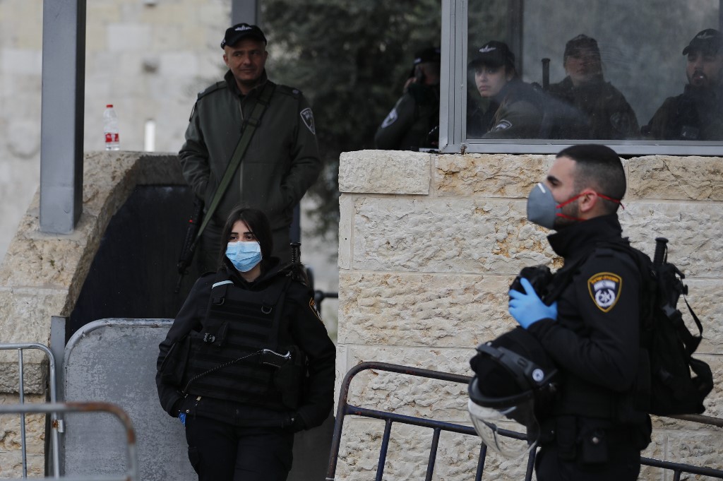 Israeli security forces stand guard in Jerusalem’s Old City on 20 March (AFP)