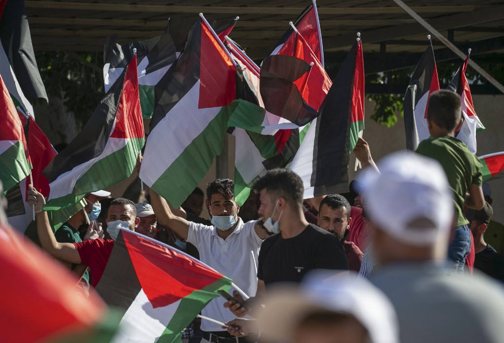 Palestinians protest against Israeli annexation plans in the Jordan Valley on 27 June (AFP)