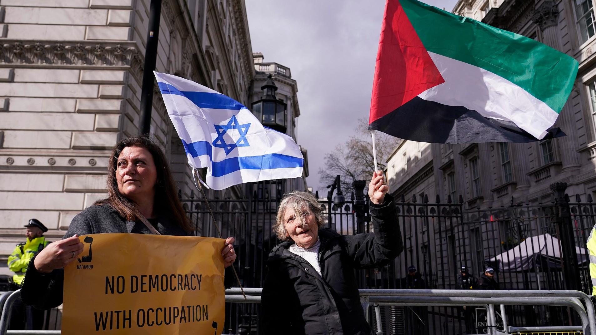 Protestors demonstrate during the visit of Israeli Prime Minister Benjamin Netanyahu to 10 Downing Street in London, Friday, March 24, 2023.