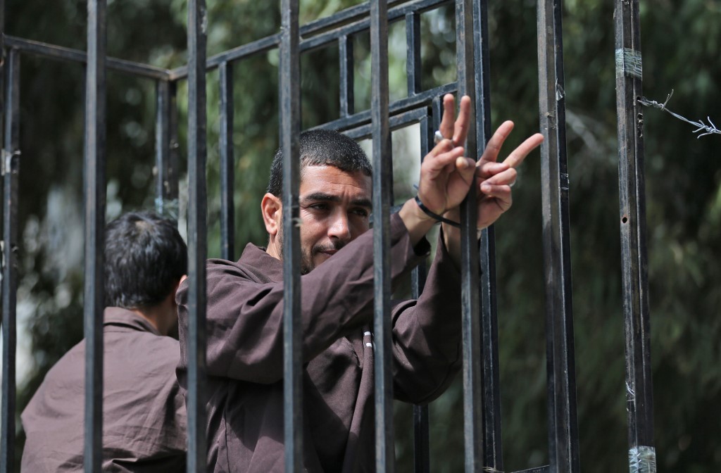 Demonstrators mark Palestinian Prisoners’ Day on 17 April in Gaza City (AFP)